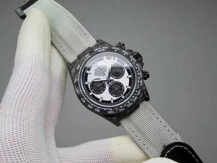 Replica Rolex Daytona Cosmograph NTPT Carbon By DIW TW Factory 1:1 Best Edition, 40MM, Carbon Fiber, Black & White Dial, Grey Nylon Strap, SWISS ETA 7750 Automatic Movement
